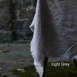 The Grey Works Frayed Edge French Linen Tablecloth Or Throw In Pale Grey