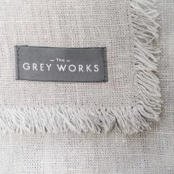 The Grey Works Frayed Edge French Linen Tablecloth Or Throw In Pale Grey