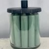 The Grey Works Glass Candle Holder With Twelve Dinner Candles In Green