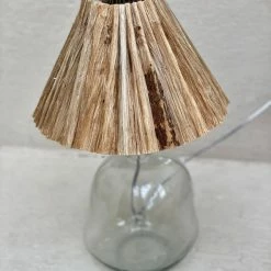 The Grey Works Lighting Hue Glass Lamp Base With A Raffia Pleat Shade