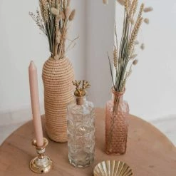 The Grey Works Ornate Bottle In A Round Design